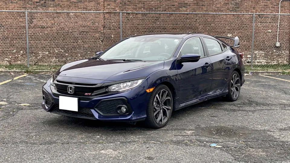 Blue Honda Civic Si sedan parked on the lot (AI placeholder photo)