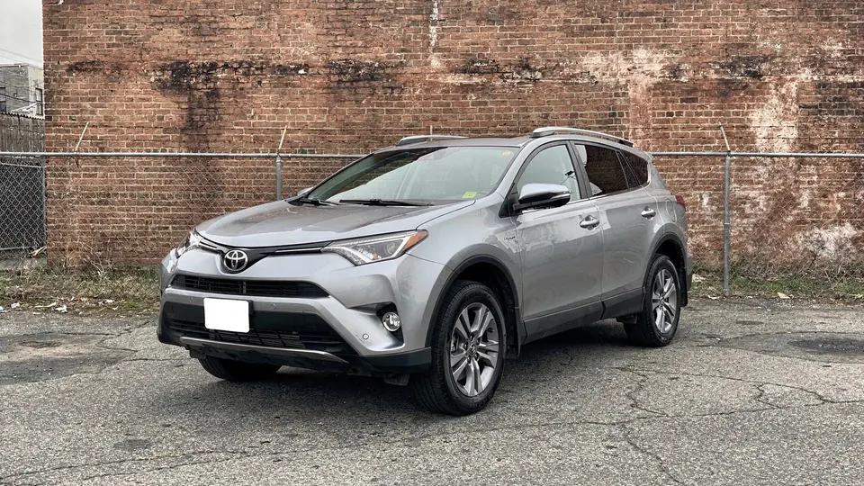 Silver Toyota RAV4 SUV parked on the lot (AI placeholder photo)